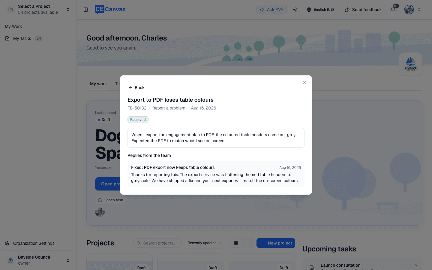 A resolved report opened to show the original description and a reply from the team